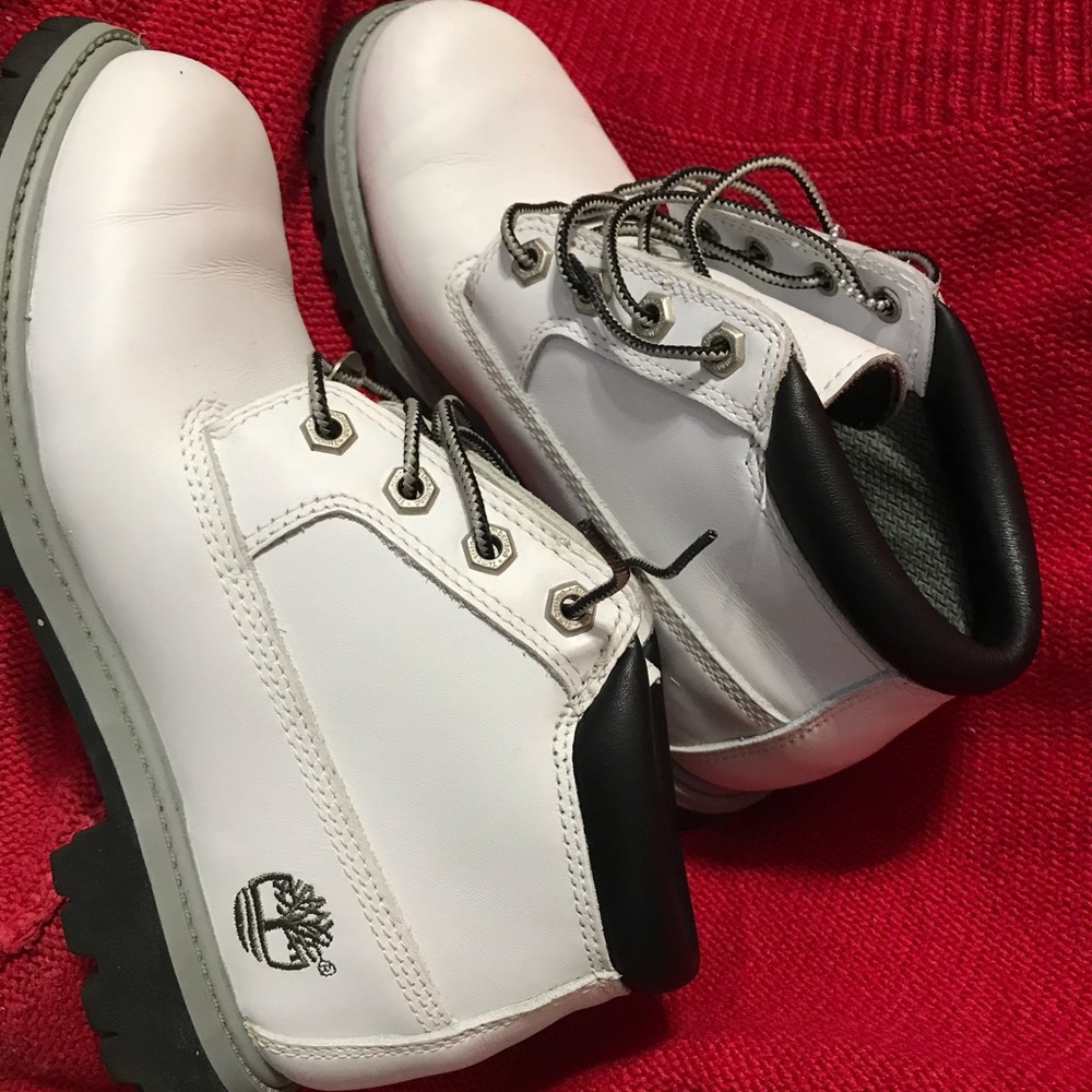 Like new white Timberland boots. Smoke-free, pet- free home. Size 7